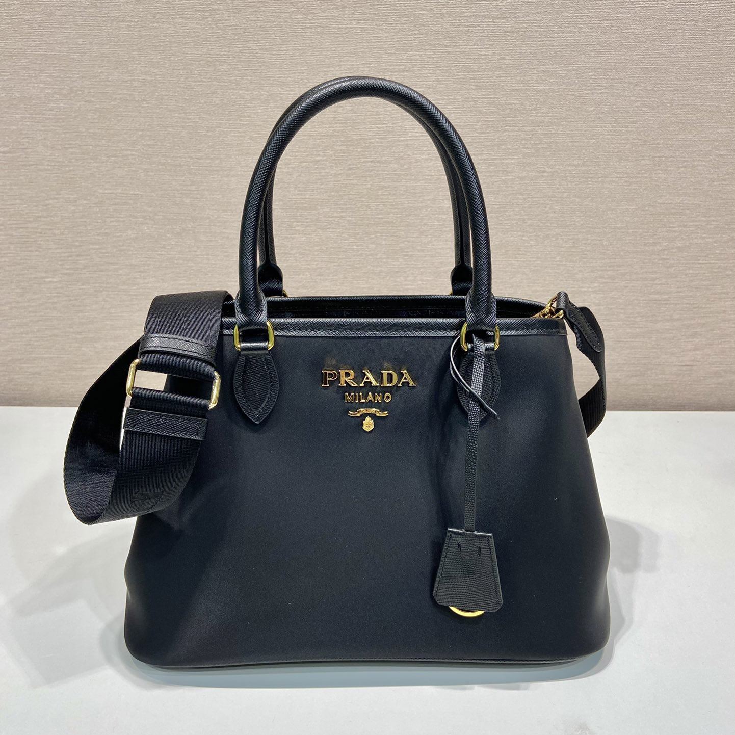 Pra*a top handle bags